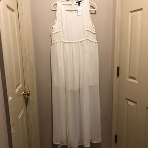 Long cream colored very unique dress with bodysuit with shorts